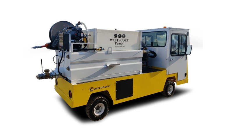 Pump out vehicle with water and waste compartment